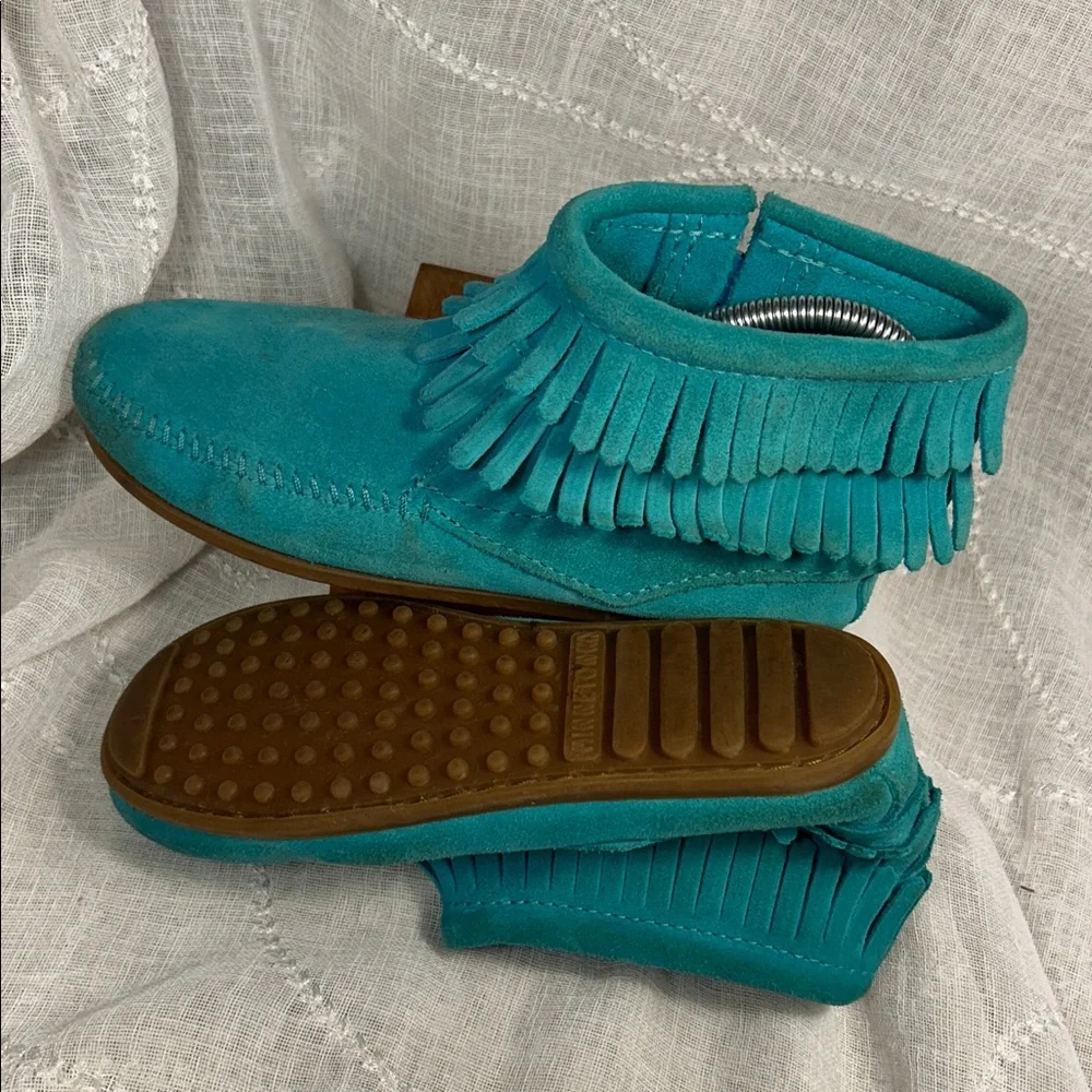Minnetonka leather fringe moccasins with side zipper